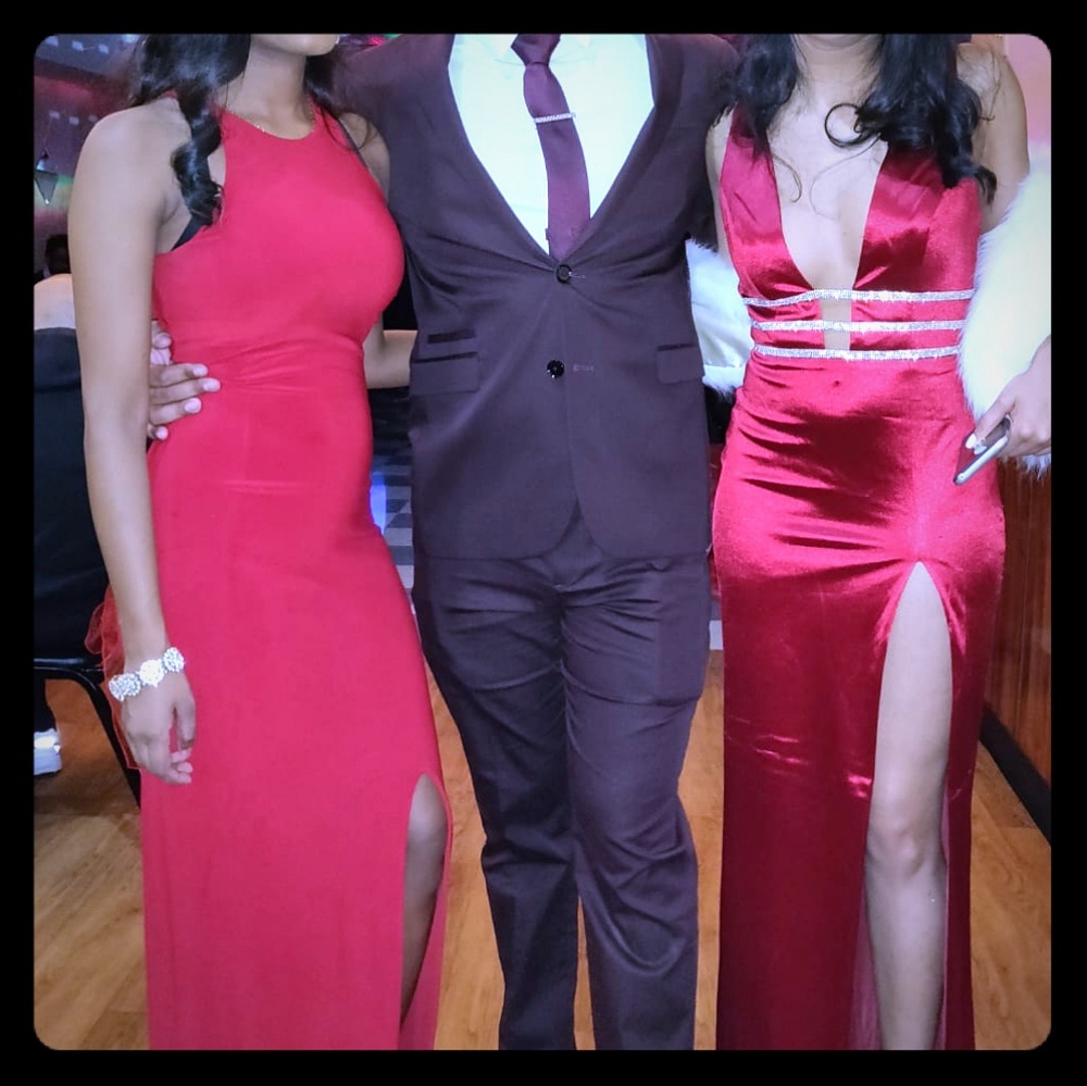 Deep red embellished dress (on the right)